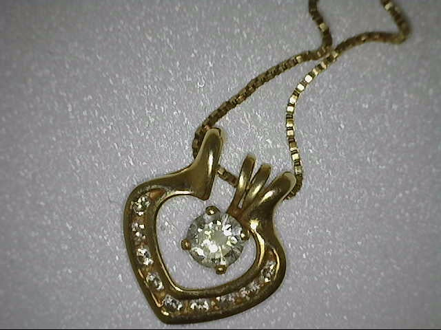 YG heart enhancer pendant with